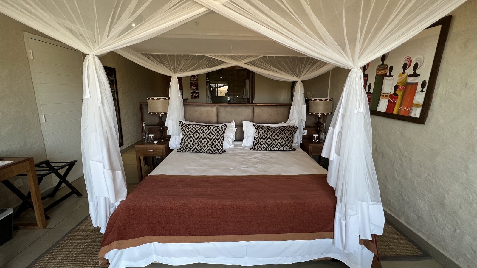 Safari lodge suite with mosquito netting